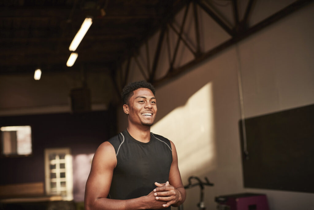 Fitness studio owner smiling