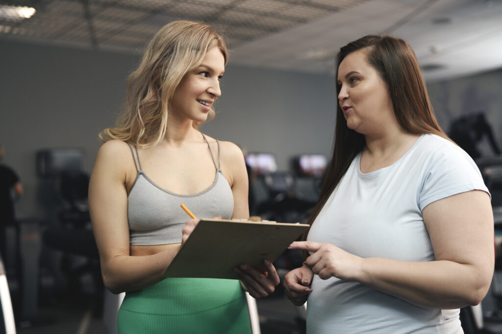 Advisor and fitness studio owner discussing